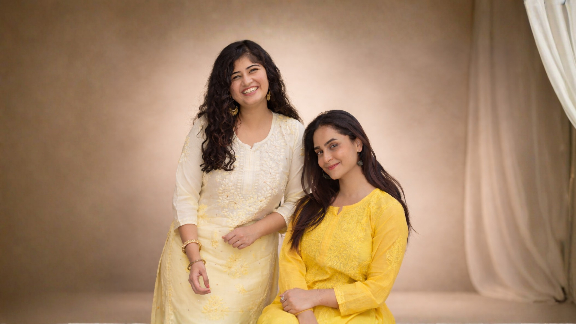 Models wearing handcrafted Chikankari kurtas